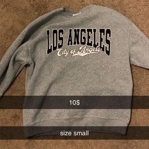 LA and Lulu hoodie. Black track pants. Grey sweats. Barbie shirts